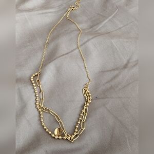 Layered Gold Plated Necklace With Word Lucky on One Charm